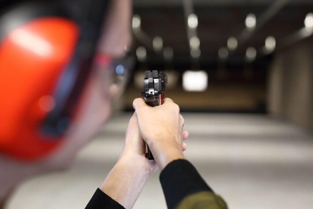 Person practicing target shooting at a shooting range