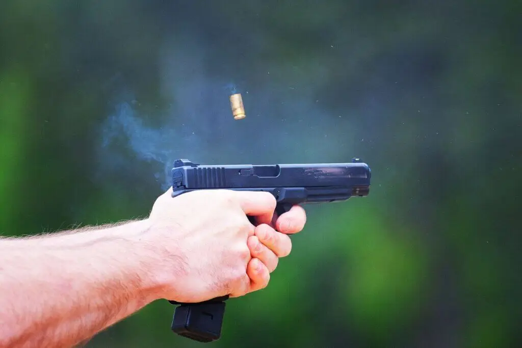 Man showing proper pistol hand grip in action