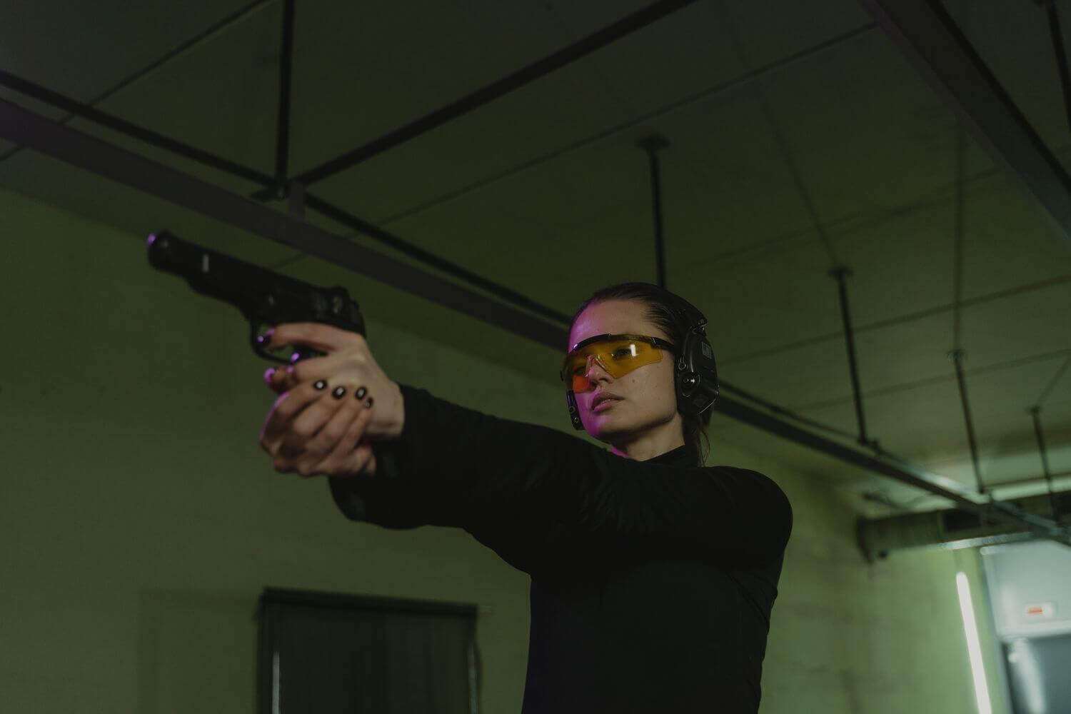 Woman demonstrating proper firearm grip