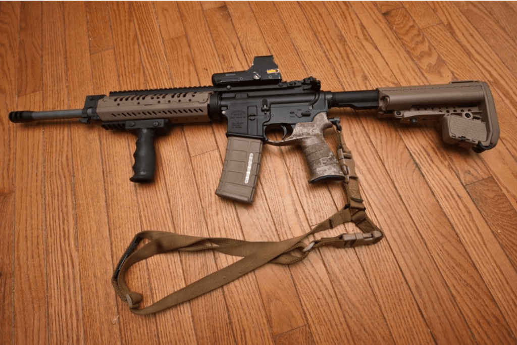 Ar-15 laying on a wood surface