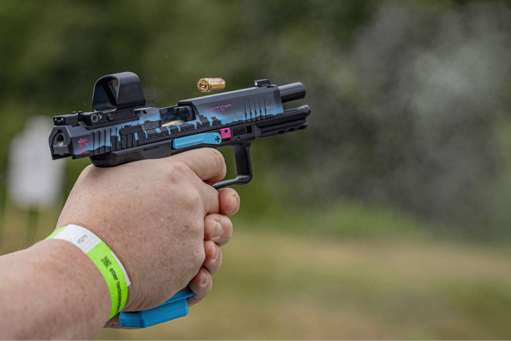 Man firing a Canik Mete SFT Miami Nights - Premier Gun Parts And Accessories | JSD Supply Man firing a Canik Mete SFT Miami Nights